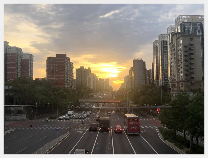 Sunset glow over Guangqumen Bridge