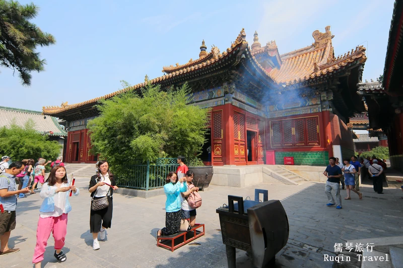  Burning incense sticks at Lama Temple