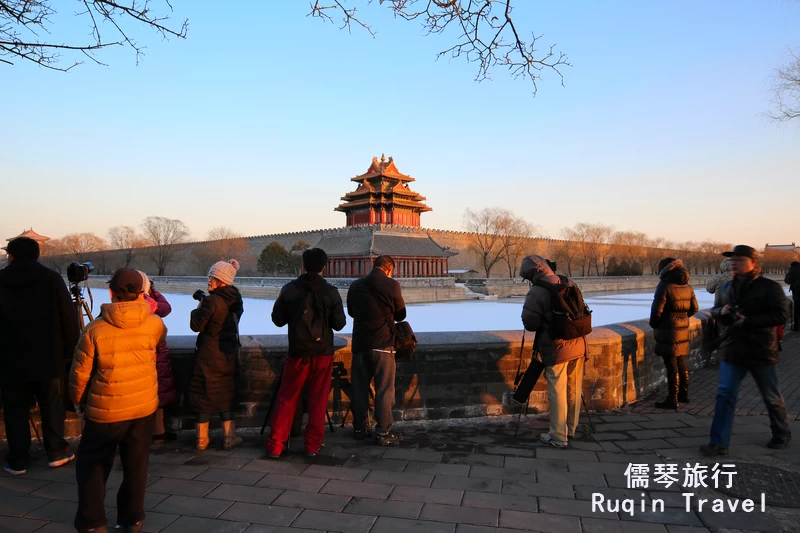 Forbidden City at sunset after  snow