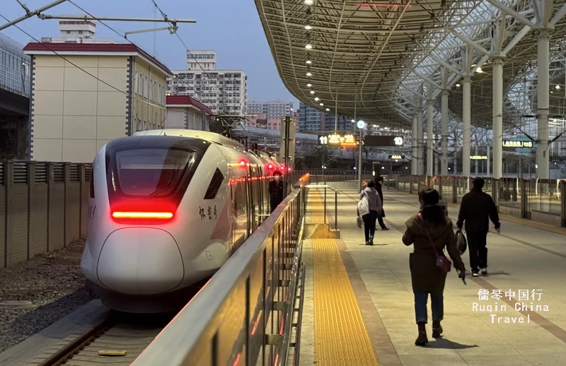 The Train S501 is leaving from the platform of Beijing North Railway Station