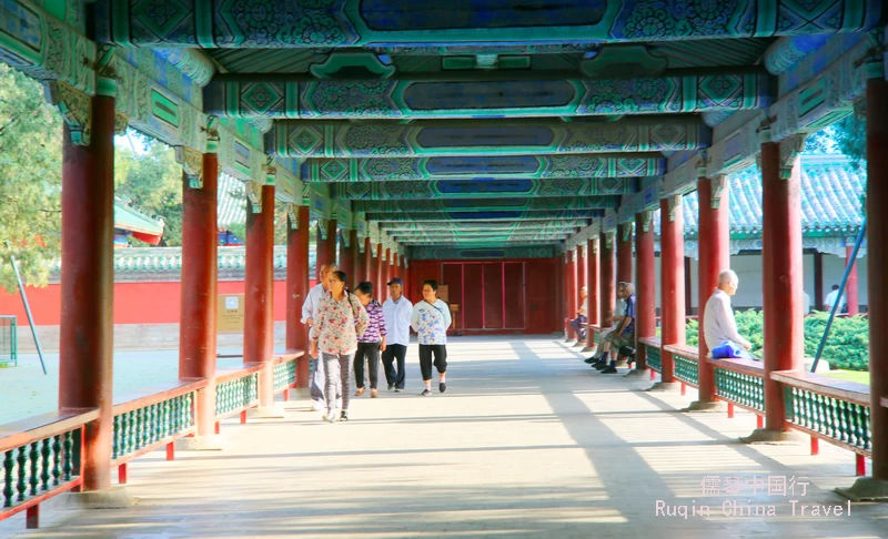 The vibrant colors and delicate patterns on the ceiling in Temple of Heaven