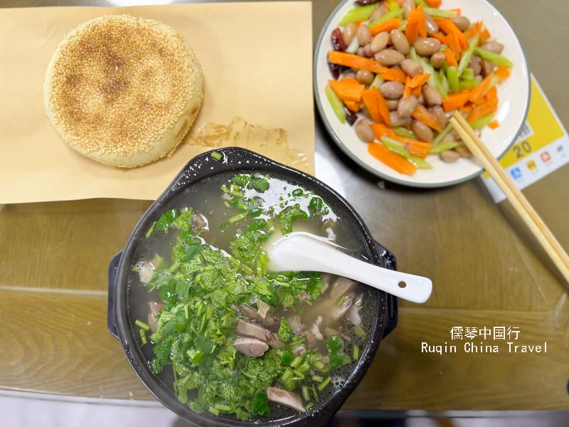 a piece of shāobǐng, a bowl of mutton soup at Chengde