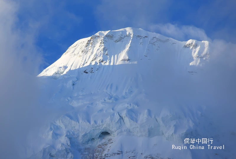 The morning sun bathed Mt. Chenrezig