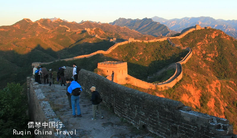 The Great Wall of Jinshanling glowing in the evening sun
