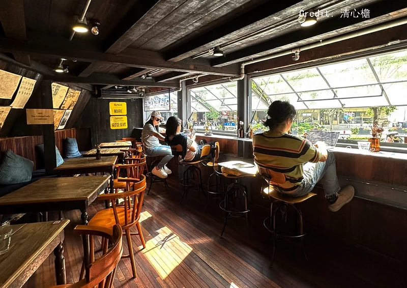 Upstairs, a triangular attic opens up at the Cottage Bar