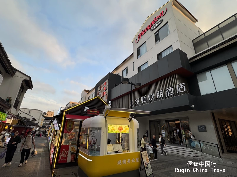 Hampton's east entrance faces the Guanqian Street's Sanyuanli pedestrian zone