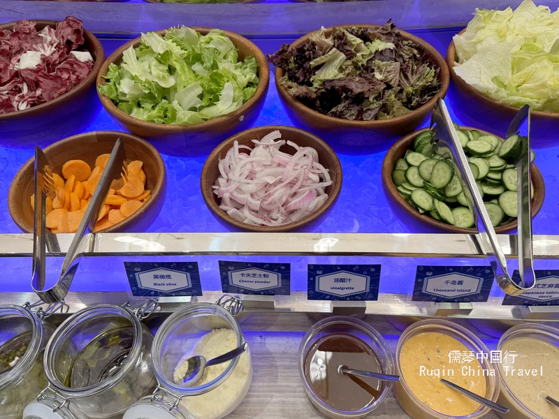 Fresh salad greens and olive oil at Hampton by Hilton Suzhou Guanqian Street