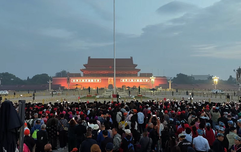 the flag-raising Crowds on Tiananmen Square