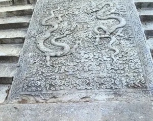 two dragons playing with a pearl