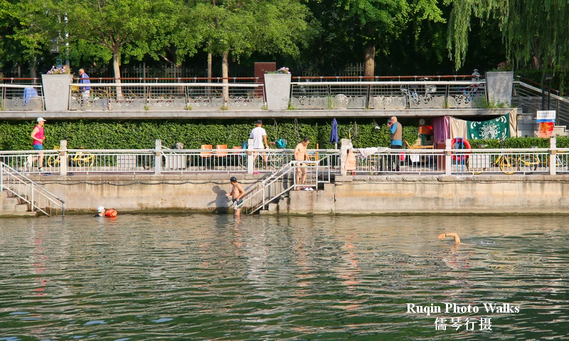 A number of local residents were already in the water at Beijing east city moat