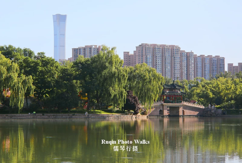 China Zun Tower rises in the distance beyond Longtan Lake Park.