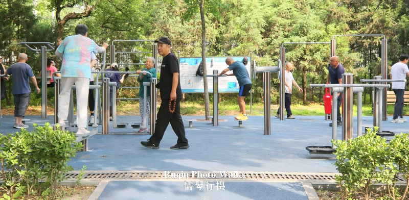 people used exercise equipment much like those in Temple of Heaven at Longtan Mid Lake