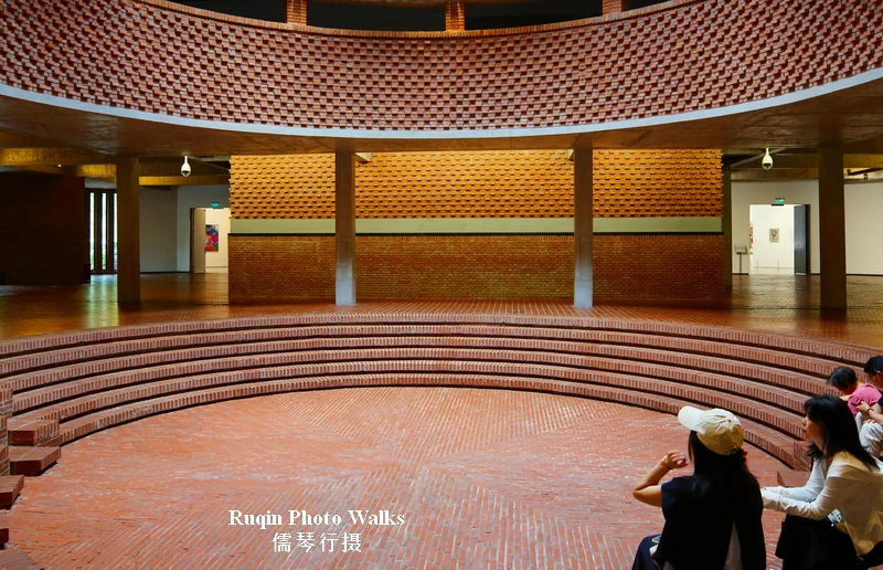 The steps around the hall spread outward in soft ring in Beijing Red Brick Art Museum