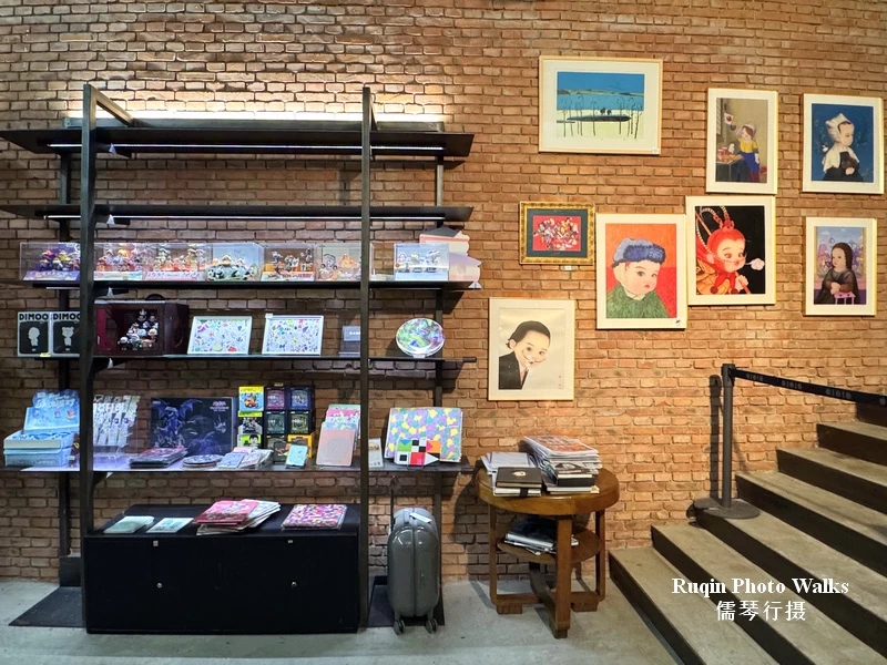 On the shelves, there are small printed objects at the design shop at Red Brick Art Museum