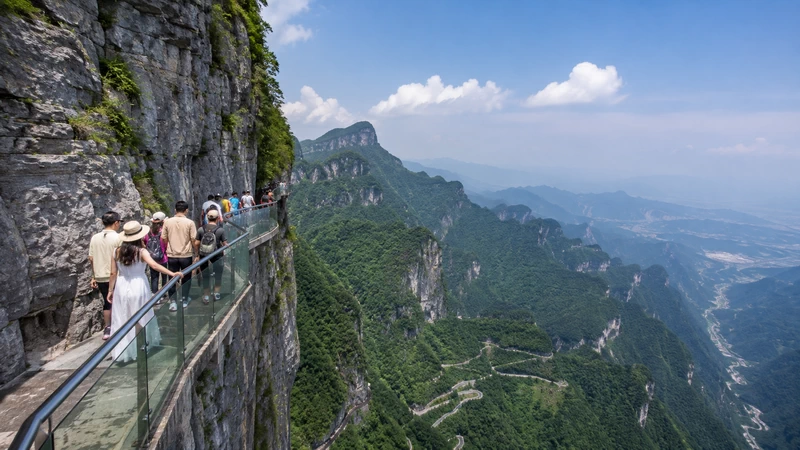 Use the cliffside paths for wider landscape work at Tianmen Mountai n