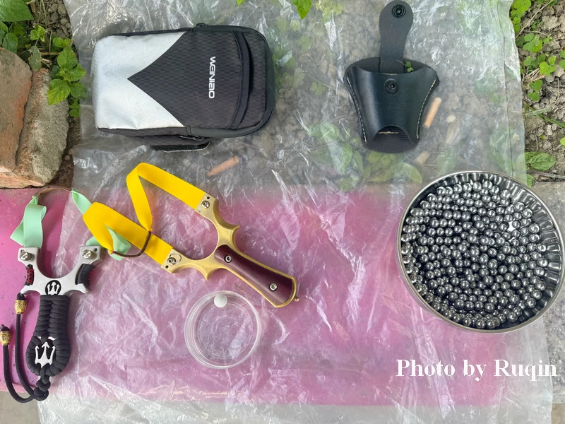 Lao Zhang showed me his slingshot and shooting gear