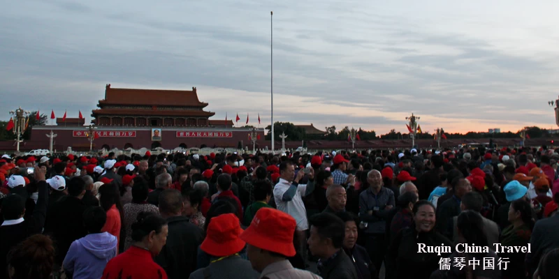 Large crowds gathering for the flag-raising ceremony on Tiananmen Square