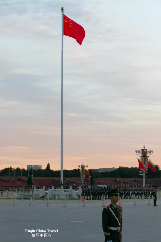 The flag is now fully raised at Tiananmen Square