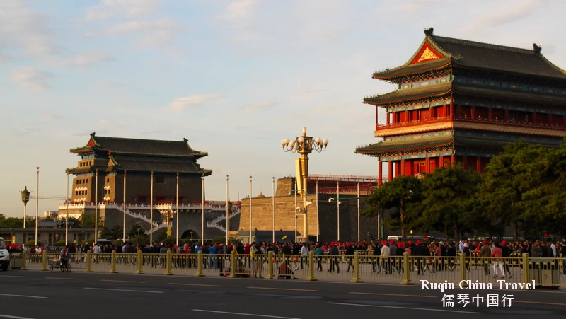 Some visitors head towards Qianmen Street after the flag-raising ceremony.