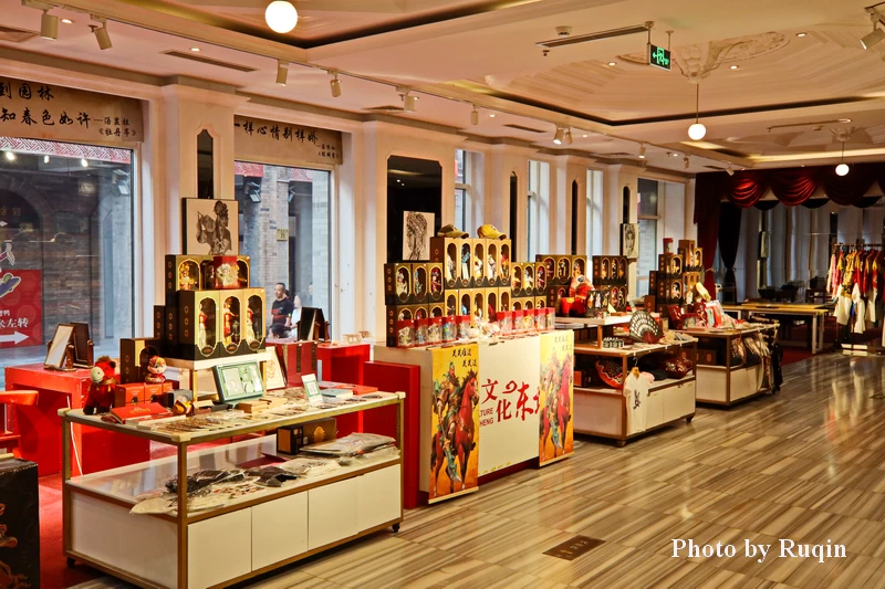 cultural products and souvenirs based on opera characters and designs at Tianleyuan Theater